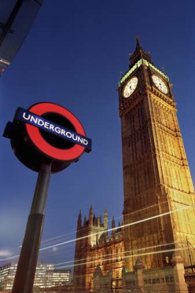 London Underground sign next to Big Ben.