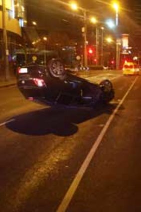 The car overturned after an accident on Clarendon Street.