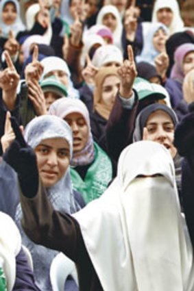 Headscarf  ‘‘as essential as prayer’’ ... Hamas supporters celebrate its election in 2006.