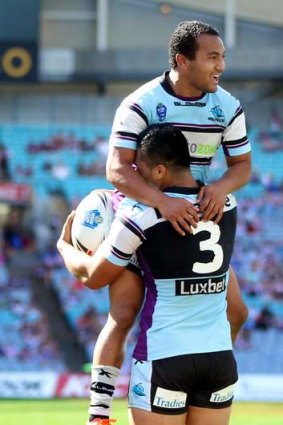 Bagged a double: Sharks centre Krisome Auva'a is congratulated after scoring in the NSW Cup grand final.