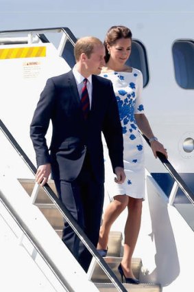 Prince William, Duke of Cambridge and Catherine, Duchess of Cambridge arrive at the Royal Australian Airforce Base at Amberley.