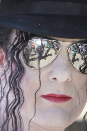 Michael Jackson look-alike Tommie O'Boyle stands at the gates of the late Michael Jackson's former residence, Neverland Ranch.