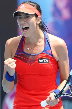 Garbine Muguruza celebrates winning a critical point in the final.