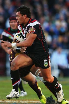 Elijah Taylor of the Warriors makes a run during the round 16 match against the Brisbane Broncos.