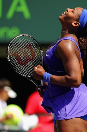 Serena Williams celebrates winning her match against Samantha Stosur at the Sony Ericsson Open.