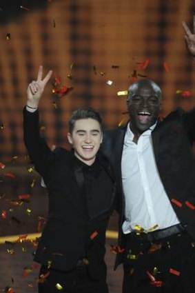 He’s the voice … Harrison Craig celebrates winning <i>The Voice</i> in June with his mentor, Seal.