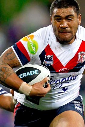 Heavy hitter . . .  Mose Masoe of the Roosters.