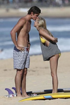 Close-up: The Voice's Laura-Leigh Smith and boyfriend surfer Jack Entwistle at Manly Beach. 