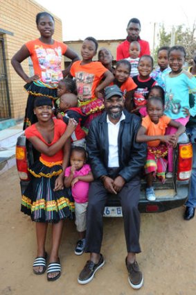 Polygamist Robert Chauke with some of his 26 children.