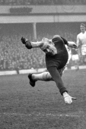Agile: Bert Trautmann makes a savage save against West Ham United in 1959.