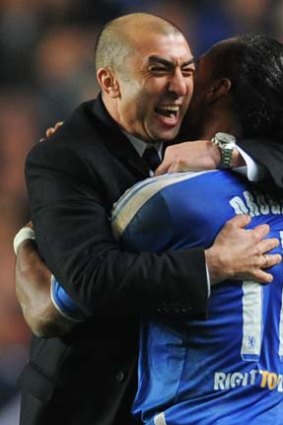Roberto Di Matteo, caretaker manager of Chelsea celebrates victory with Didier Drogba.