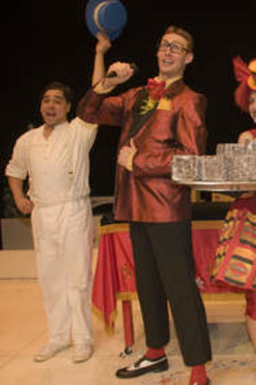 Mykel Brown (Casino Assistant), Luke Hines (Hobart Casino Compere) Dana Gishen (Koala), Andrew Dunne (Casino Assistant), in a scene from <i>Possum Magic</i>.