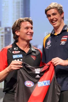 Essendon coach James Hird looks very pleased to have father-son draft pick Joe Daniher on board.
