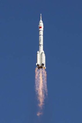15-day mission: The Long March 2-F rocket loaded with Shenzhou-10 .