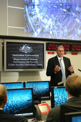 Former minister for Defence, John Faulkner at the opening of  Defence's new Cyber Security Operations Centre in Canberra.