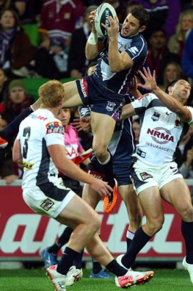 Up he rises &#8230; Storm star Billy Slater.