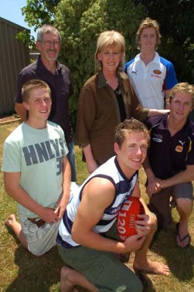 Selwood family [November 25, 2006] - left to right - Joel Selwood, Bryce, Maree, Troy Selwood & Scott Selwood.  Adam at front with footy.