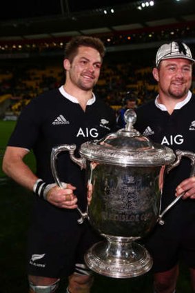 Richie McCaw and Tony Woodcock hold the Bledisloe Cup.