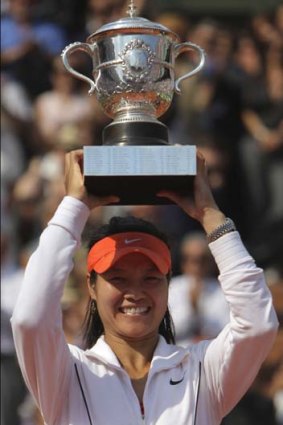 Winner ... Li Na defeats Italy's Francesca Schiavone in the French Open.