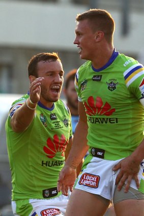 Jack Wighton of the Raiders celebrates a try against the Sharks.