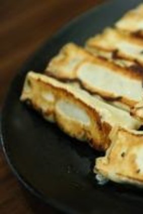 House specialty: Pan-fried "Melbourne dumplings" of chicken, garlic, lemon and parsley.