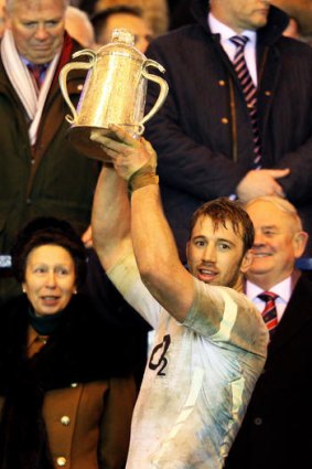 Captain of England, Chris Robshaw, lifts the Calcutta Cup.