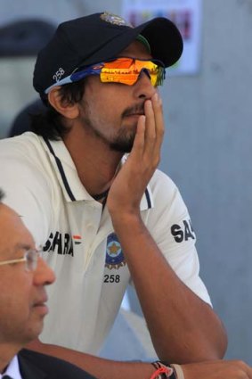 Sidelined &#8230; Ishant Sharma rests his injured ankle.