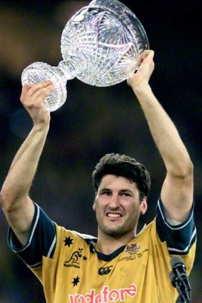 No better feeling ... John Eales with the Tom Richards Trophy.