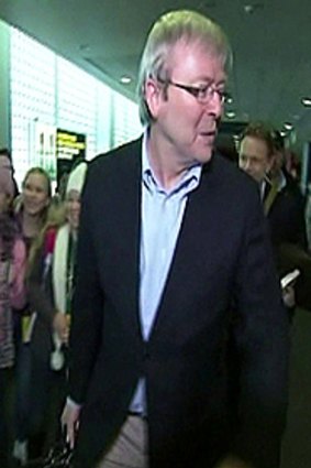 Kevin Rudd at Canberra airport yesterday.
