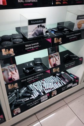 A counter at Target displaying the fake MAC cosmetics.