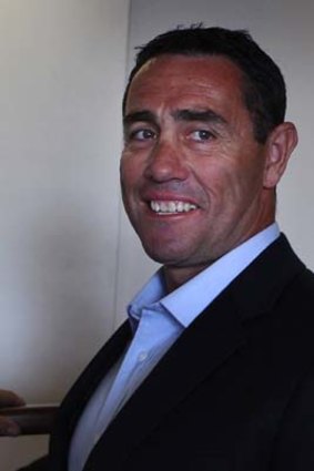 Suitably pleased: Shane Flanagan can’t keep the smile off his face at yesterday’s press conference at which he was reinstated as Cronulla coach.