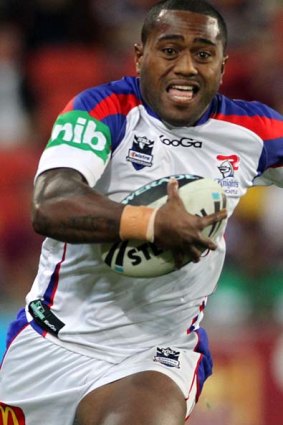 Tryscoring threat . . . Akuila Uate of the Knights.