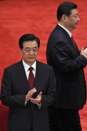 Chinese President Hu Jintao, front, and his designated successor, Vice-President Xi Jinping.
