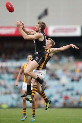Port's Jackson Trengove goes for a mark.