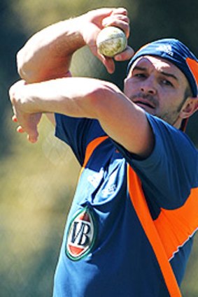 In a spin: Jason Krejza bowls in the nets at an Australian training session.