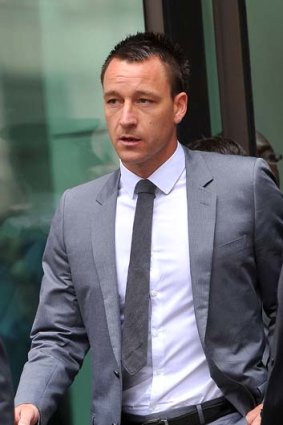 John Terry leaves court after he was found not guilty of racial abuse.