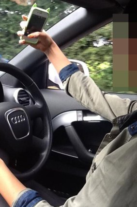 Road users have been warned not to take 'selfies' while driving.