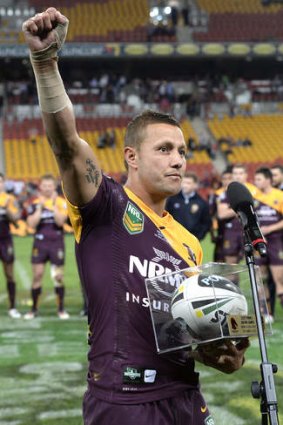 Scott Prince of the Broncos celebrates his 300th and final game of his career.