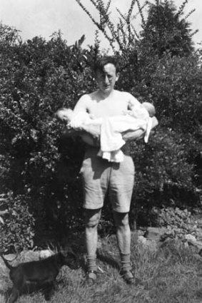 Juggling act ... Lionel with his two babies in June 1946.