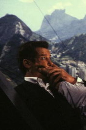 Roger Moore, as Bond, does battle with Jaws in Rio de Janeiro.
