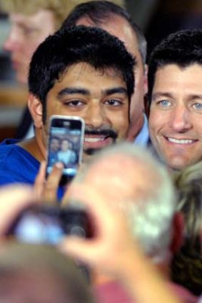 Crowd-puller &#8230; Paul Ryan, right, meets supporters.