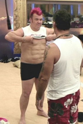 Darryn Lyons shows off his 'six-pack' on <i>Celebrity Big Brother</i>.