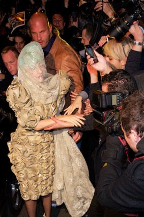 Gaggle ... Lady Gaga arrives at Nevermind nightclub in Darlinghurst.