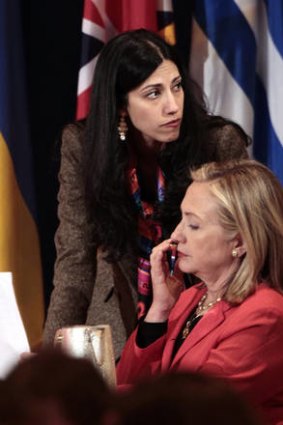 'Loyal servant' Huma Abedin, pictured with Hillary Clinton.