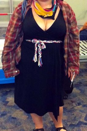 A woman named Avital poses for a picture at McCarran International Airport in Las Vegas, showing what she was wearing after she says a Southwest Airlines gate agent approached her, alleging she was showing too much cleavage.