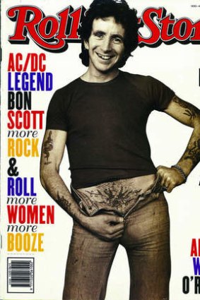 Rolling with the times: Bon Scott, the late AC/DC singer and tight-jeans exponent, shows off his impressive tattoo in an exhibition.