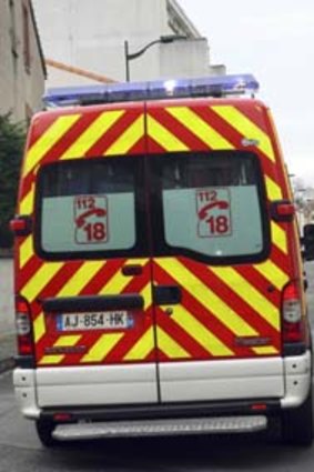 An ambulance evacuated injured policemen.
