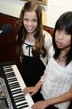 Ritchell Lim (right) has not let blindness stop her from making three albums.