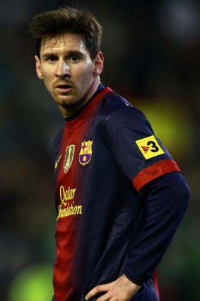 Out for the season: Barcelona' Lionel Messi.