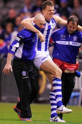 North Melbourne's Hamish McIntosh injured in round seven against the Western Bulldogs.